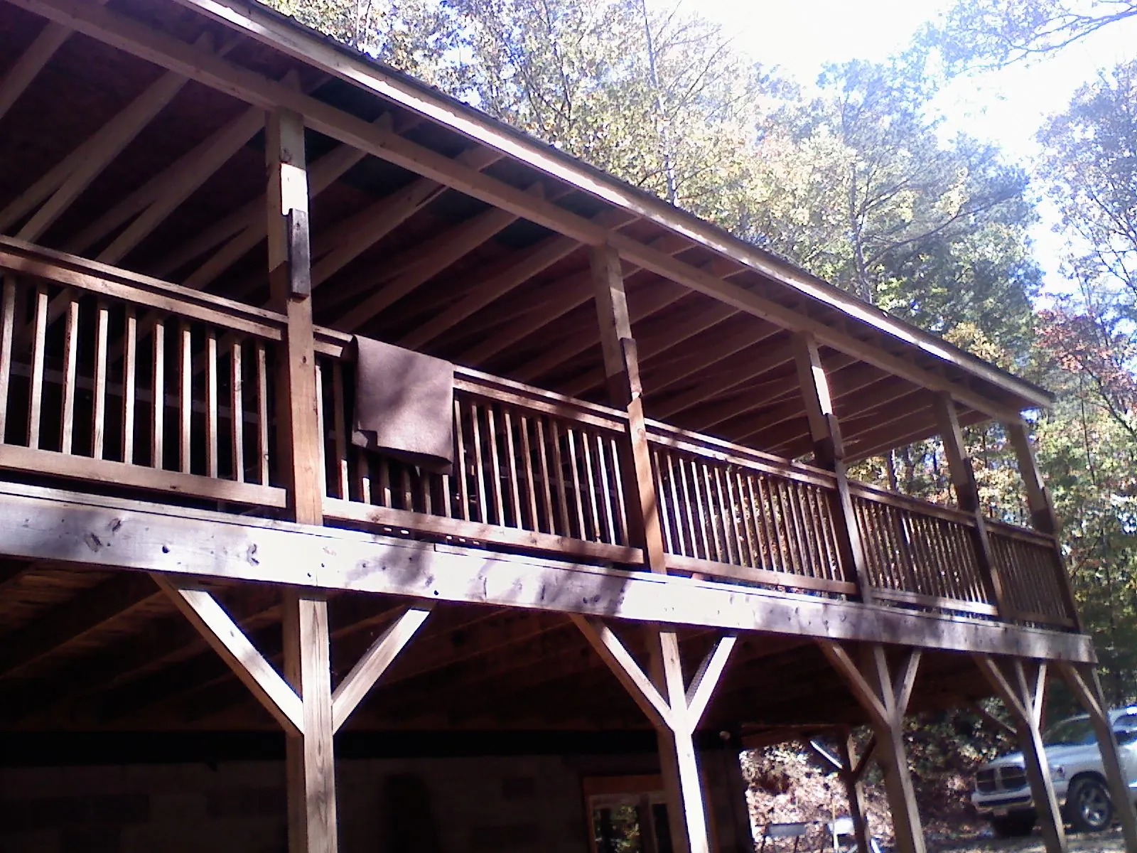 Timber framing under a new elevated porch and deck — Roof Leak Repair in Pine Level by Roofing Brothers